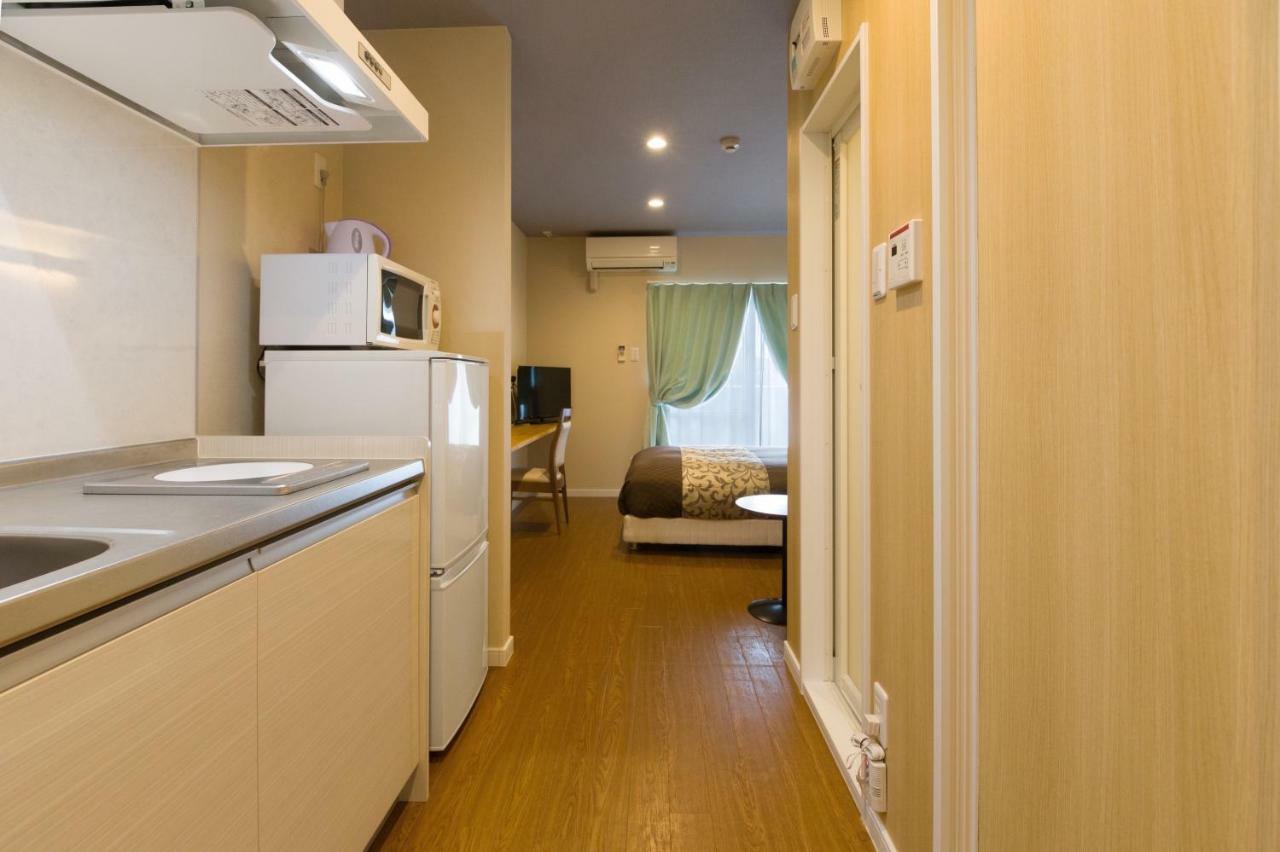 Mr. Kinjo In Shiozaki Aparthotel Itoman Exterior photo